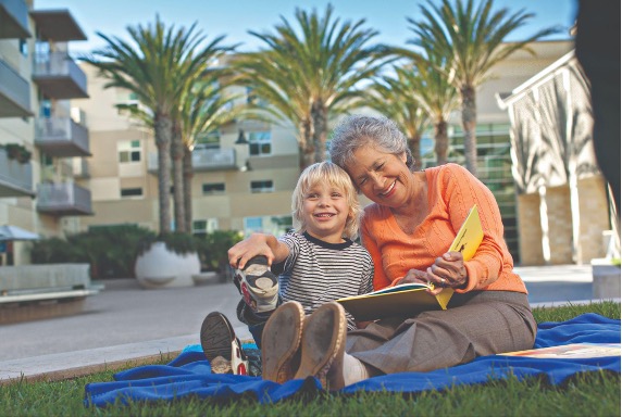 Elderly woman with her grandson at a park